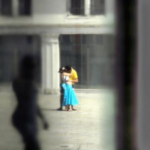 GiRL PASSiNG A KiSS WiTHiN A WiNDOW.jpg